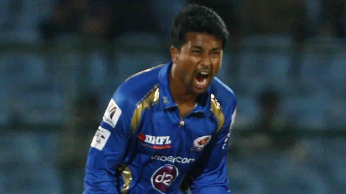 MI Bowler Pragyan Ojha celebrates fall of wicket during the match between Lions and Mumbai Indians at Sawai Mansingh Stadium, Jaipur on Sept. 27, 2013. (Photo IANS)