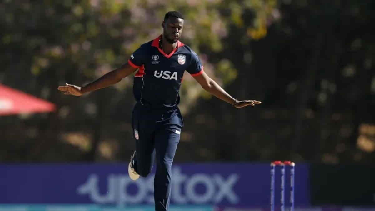 Why is USA cricketer Kyle Phillip suspended from bowling?