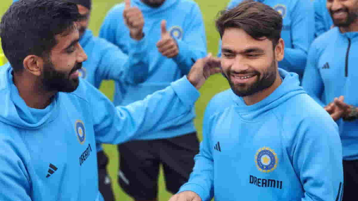 Malahide Indian cricketer Rinku Singh receives the cap from captain Jasprit Bumrah on his debut before the start of the first T20 cricket match between India and Ireland at Malahide Cricket Club Ground in Malahide