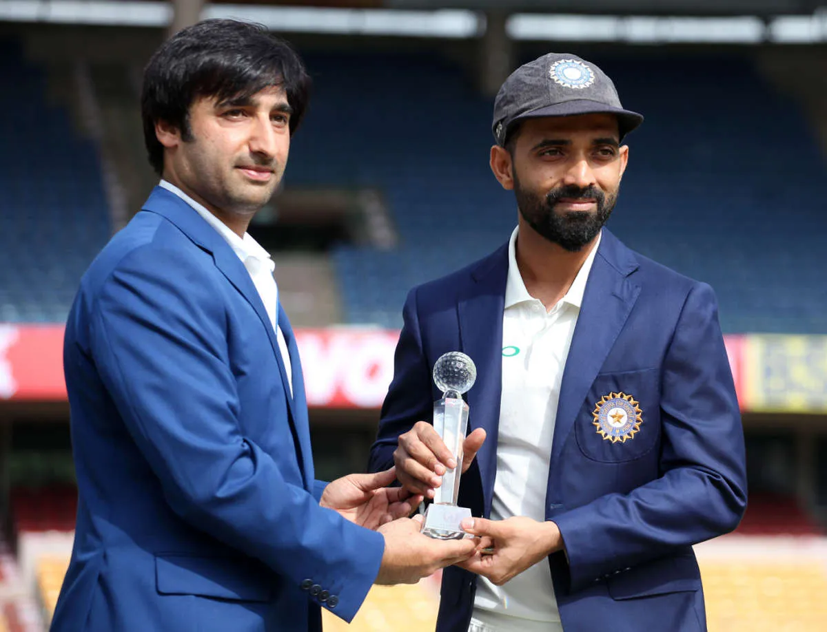 Ajinkya Rahane and Asghar Afghan before Afghanistan's first Test match against India in Bengaluru 2018