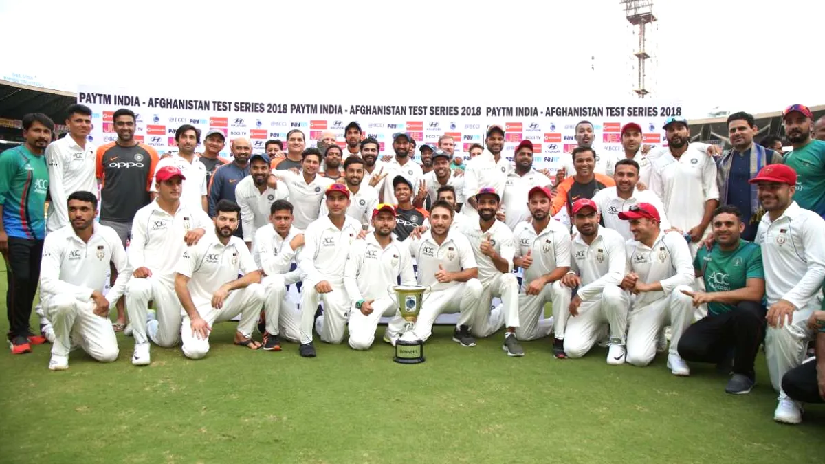 India and Afghanistan players pose together after Afghanistan's first-ever Test match in Bengaluru 2018 - India vs Afghanistan Test History